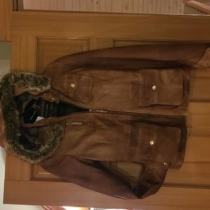 Very soft leather coat. Designer is black rivet.. SZ small Like New!